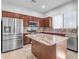 Spacious kitchen with stainless steel appliances and granite countertops at 2067 W Periwinkle Way, Chandler, AZ 85248