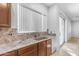 Kitchen with granite countertops and stainless steel sink at 2067 W Periwinkle Way, Chandler, AZ 85248