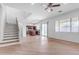 Bright living room with hardwood floors and staircase at 2067 W Periwinkle Way, Chandler, AZ 85248