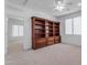 Open loft with built-in shelving and access to another room at 2067 W Periwinkle Way, Chandler, AZ 85248