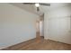 This bedroom features hardwood floors and a closet, ideal for a minimalist design at 2200 N Iowa St, Chandler, AZ 85225