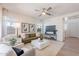 Inviting living room with neutral furniture, a contemporary TV stand, and an open layout at 2200 N Iowa St, Chandler, AZ 85225