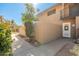 This building's exterior features an enclosed private yard area with block walls and a pedestrian entrance door at 1136 N 84Th Pl, Scottsdale, AZ 85257