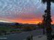 Scenic sunset view from property, overlooking mountains and golf course at 16804 E Monterey Dr, Fountain Hills, AZ 85268