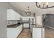 Modern kitchen with stainless steel appliances and island at 23559 W Wayland Dr, Buckeye, AZ 85326