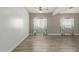 Living room featuring hardwood floors and ceiling fan at 23559 W Wayland Dr, Buckeye, AZ 85326