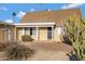 House exterior with covered entryway and desert landscaping at 2929 E Bloomfield Rd, Phoenix, AZ 85032