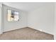 Simple bedroom with neutral walls and carpet at 4723 N 84Th Ln, Phoenix, AZ 85037