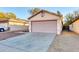 Attached garage with an automatic door and driveway at 4723 N 84Th Ln, Phoenix, AZ 85037