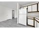 Kitchen features white appliances and wood cabinets at 4723 N 84Th Ln, Phoenix, AZ 85037