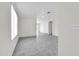 Bright living room with grey tile floors and neutral walls at 4723 N 84Th Ln, Phoenix, AZ 85037