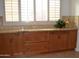 Kitchen counter with granite countertop and wood cabinets at 13204 W Palo Verde Dr, Litchfield Park, AZ 85340