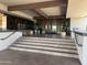 Main entrance to the clubhouse has a concrete staircase and large glass doors at 25609 N Forest Rd # 13, Rio Verde, AZ 85263