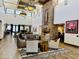 Spacious lobby featuring a stone fireplace, comfortable seating, and elegant decor at 25609 N Forest Rd # 13, Rio Verde, AZ 85263