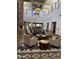 Open-concept lobby area with high ceilings, large windows, and comfortable seating at 25609 N Forest Rd # 13, Rio Verde, AZ 85263