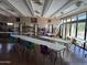 Spacious meeting room with long tables, colorful chairs, and scenic views at 25609 N Forest Rd # 13, Rio Verde, AZ 85263