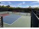 Community pickleball courts offering a secure fenced perimeter at 25609 N Forest Rd # 13, Rio Verde, AZ 85263