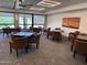 Welcoming sitting area with comfortable chairs and views to the community's landscaping at 25609 N Forest Rd # 13, Rio Verde, AZ 85263