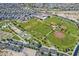 Aerial view of community park with sports fields, playground, and parking at 30080 W Fairmount Ave, Buckeye, AZ 85396