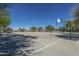 Outdoor basketball court with markings and lighting at 30080 W Fairmount Ave, Buckeye, AZ 85396