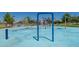 Community splash pad features colorful water features at 30080 W Fairmount Ave, Buckeye, AZ 85396