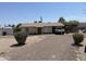 Charming single-story home features a gravel front yard and a convenient carport for covered parking at 925 E Henry St, Tempe, AZ 85288