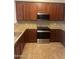 Well-equipped kitchen with stainless steel appliances and beautiful cabinetry at 11000 N 77Th Pl # 1083, Scottsdale, AZ 85260