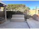Relaxing backyard patio with built-in seating and fire pit at 12742 W Ash St, El Mirage, AZ 85335