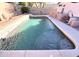 Backyard pool for hot summer days, with a diving board, perfect for cooling off and having fun in the sun at 12742 W Ash St, El Mirage, AZ 85335