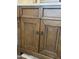 Close-up of bathroom vanity with wood cabinets and decorative hardware, offering storage space at 12742 W Ash St, El Mirage, AZ 85335