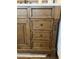 Close-up of bathroom vanity with wood drawers and decorative hardware, offering storage space at 12742 W Ash St, El Mirage, AZ 85335
