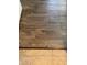 Wood-look tile flooring in this home, adjoining to beige tile at 12742 W Ash St, El Mirage, AZ 85335