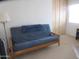 Bedroom features a futon and a built in wardrobe for storage at 1881 E Kerby Farms Rd, Chandler, AZ 85249