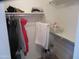 Walk in closet with clothes and a shelf for storage at 1881 E Kerby Farms Rd, Chandler, AZ 85249