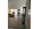 Open floor plan showcasing the living room with sliding glass doors to a screened-in patio at 1881 E Kerby Farms Rd, Chandler, AZ 85249