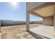 Large backyard with covered patio and block wall at 18949 W Ocotillo Rd, Waddell, AZ 85355