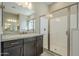 Modern bathroom with shower and vanity at 18949 W Ocotillo Rd, Waddell, AZ 85355