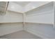 Large walk-in closet with double hanging rods at 18949 W Ocotillo Rd, Waddell, AZ 85355