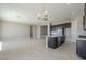 Open concept dining room with tile floors and sliding glass doors at 18949 W Ocotillo Rd, Waddell, AZ 85355