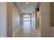 Bright hallway with tile floors leading to the living room at 18949 W Ocotillo Rd, Waddell, AZ 85355