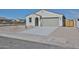 Charming single-story home featuring a neutral color palette, two-car garage and low maintenance desert landscaping at 24620 W Hopi W St, Buckeye, AZ 85326