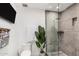 Bathroom featuring a glass enclosed shower at 3800 E Lincoln Dr # 23, Phoenix, AZ 85018