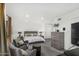 Spacious bedroom features stylish decor, a sitting area, a modern dresser, and an inviting atmosphere at 3800 E Lincoln Dr # 23, Phoenix, AZ 85018