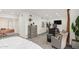 This stylish bedroom features a dedicated desk, a sitting area, neutral tones, and plenty of storage at 3800 E Lincoln Dr # 23, Phoenix, AZ 85018