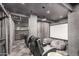 This home theater room has tiered seating, a large screen and projector for a cozy viewing experience at 3800 E Lincoln Dr # 23, Phoenix, AZ 85018