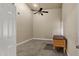 Simple bedroom with ceiling fan and wood desk at 9478 E Corrine Dr, Scottsdale, AZ 85260