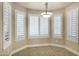 Bright breakfast nook with white plantation shutters at 9478 E Corrine Dr, Scottsdale, AZ 85260