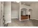 High ceilings and tiled entryway with a view into the living area at 9478 E Corrine Dr, Scottsdale, AZ 85260