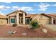 Single-story house with desert landscaping and two-car garage at 9478 E Corrine Dr, Scottsdale, AZ 85260