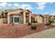 Single story home with terracotta tile roof and drought-tolerant landscaping at 9478 E Corrine Dr, Scottsdale, AZ 85260